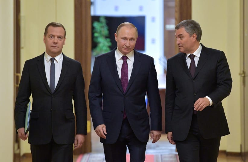  (R-L) Russia's State Duma Speaker Vyacheslav Volodin, President Vladimir Putin and Dmitry Medvedev, who was nominated as the candidate for the post of Prime Minister, walk before a session of the State Duma, the lower house of parliament, in Moscow Russia May 8, 2018. (photo credit: Sputnik/Alexander Astafyev/Pool via REUTERS)