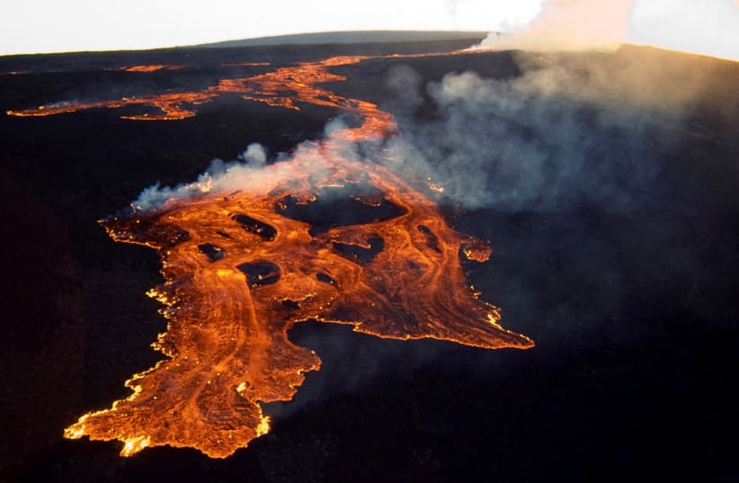  The Mauna Loa volcano on the island of Hawaii is shown in this March 25, 1984 handout photo provided by the U.S. Geological Survey, and released to Reuters on June 19, 2014. (photo credit: REUTERS/US Geological Survey/Handout via Reuters)