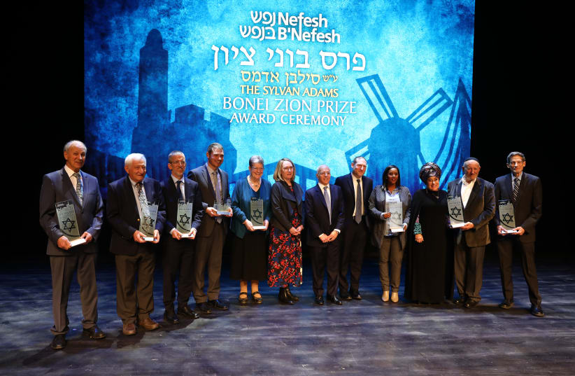  Sylvan Adams Nefesh B'Nefesh Bonei Zion award winners, with NBN co-founders Tony Gelbart and Rabbi Yehoshua Fass and Margaret Adams. (photo credit: YONIT SCHILLER)