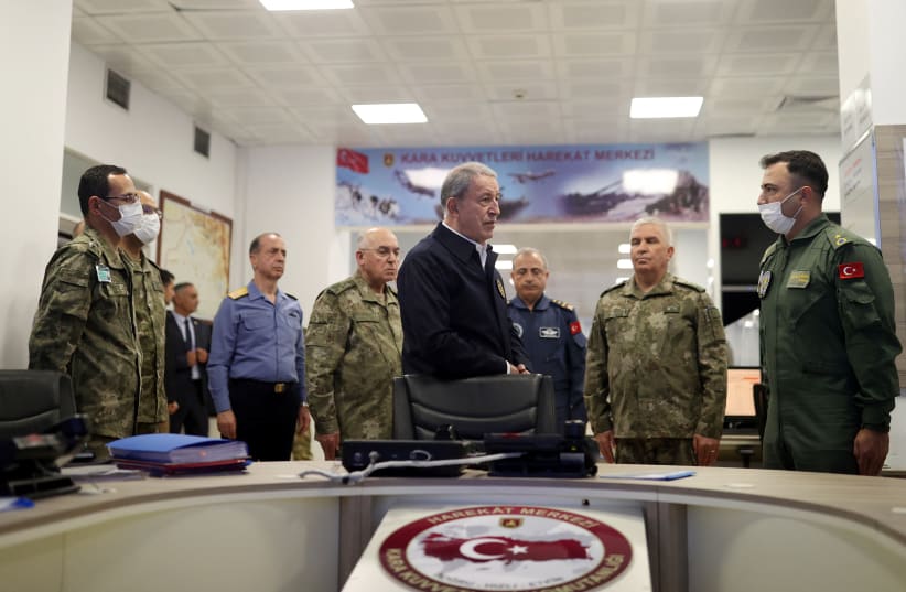  Turkish Defense Minister Hulusi Akar visits Land Forces Operation Center in Ankara (photo credit: REUTERS)