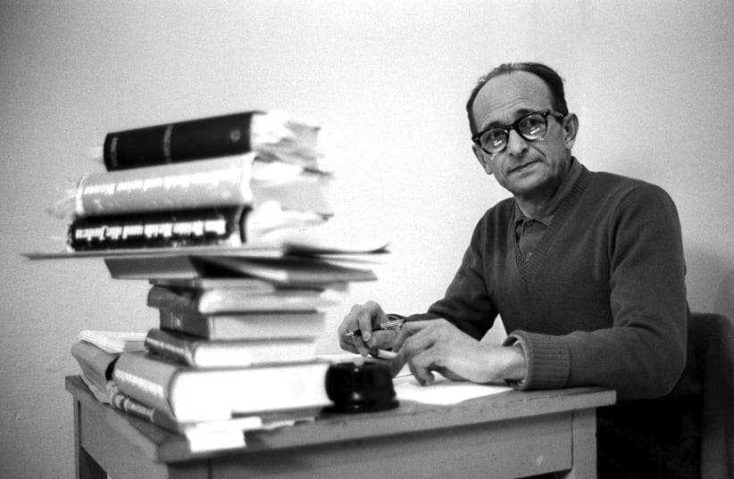  NAZI WAR criminal Adolf Eichmann sits at a desk inside his prison cell in Israel, 1961. To mark the 60th anniversary of his execution, KAN 11 aired a new series that brings to light important documentation of Eichmann’s admission of his guilt. (photo credit: REUTERS)