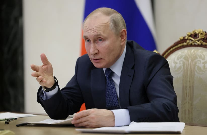  Russian President Vladimir Putin holds the annual meeting of the Presidential Council for Civil Society and Human Rights, via video link in Moscow, Russia December 7, 2022 (photo credit: VIA REUTERS)
