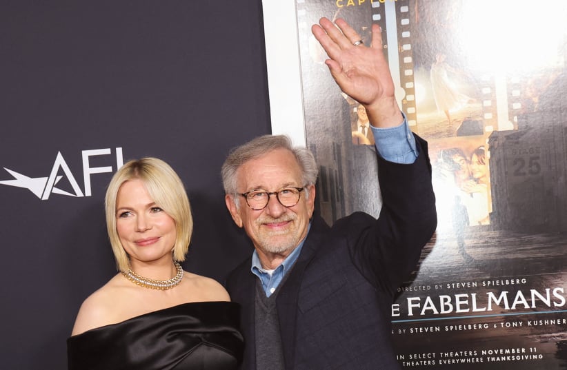  DIRECTOR STEVEN Spielberg and cast member Michelle Williams attend a premiere for ‘The Fabelmans,’ during the AFI Fest in Los Angeles, last month. (photo credit: MARIO ANZUONI/REUTERS)