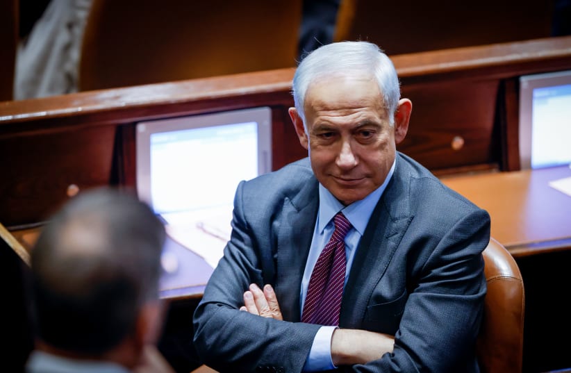  Likud Head MK Benjamin Netanyahu seen during a plenum session at the assembly hall of the Knesset, the Israeli parliament in Jerusalem, on December 19, 2022.  (photo credit: OLIVIER FITOUSSI/FLASH90)