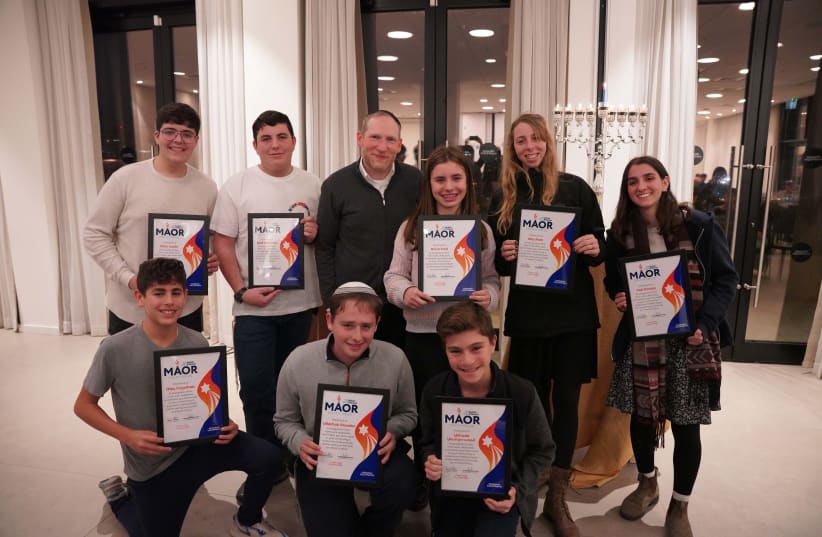  Maor Youth Prize winners pose with their award at a candle lighting ceremony at the Nefesh B'Nefesh Aliyah Campus. (photo credit: NEFESH B'NEFESH)
