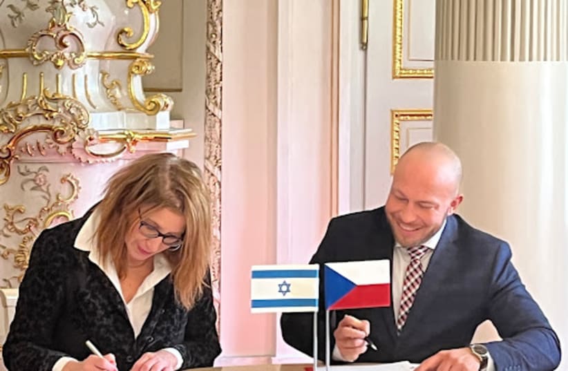  Deputy Minister of Culture of the Czech Republic  VACLAV VELCOVSKY and Nurit Tinari head of Cultural Diplomacy Bureau at the Israel Foreign Ministry signing the Cultural Cooperation Program.   (photo credit: Embassy of Israel in Czech Republic)