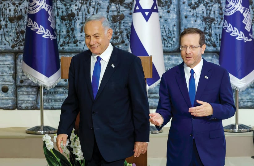  Incoming prime minister Benjamin Netanyahu is seen next to Israeli President Isaac Herzog. (photo credit: MARC ISRAEL SELLEM)