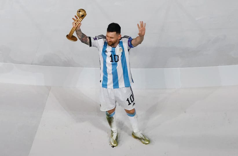  ARGENTINA’S LIONEL MESSi celebrates winning the Golden Ball award during the World Cup trophy ceremony earlier this month.  (photo credit: PETER CZIBORRA/REUTERS)