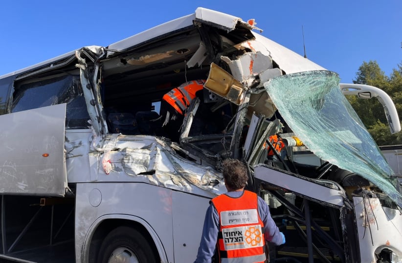  The scene of the bus crash on Highway 1 in which a 10-year-old girl was seriously injured, January 3, 2023. (photo credit: UNITED HATZALAH)