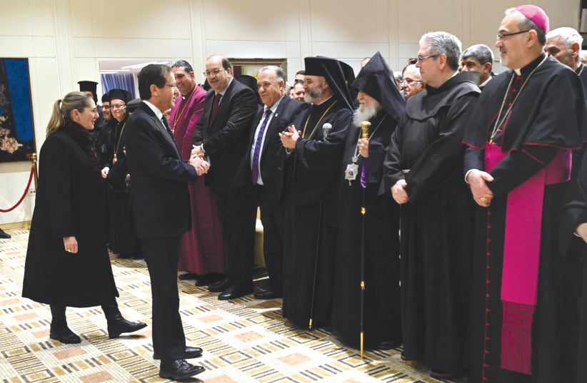  President Isaac Herzog and his wife Michal greet leaders of various Christian Churches (photo credit: HAIM ZACH/GPO)