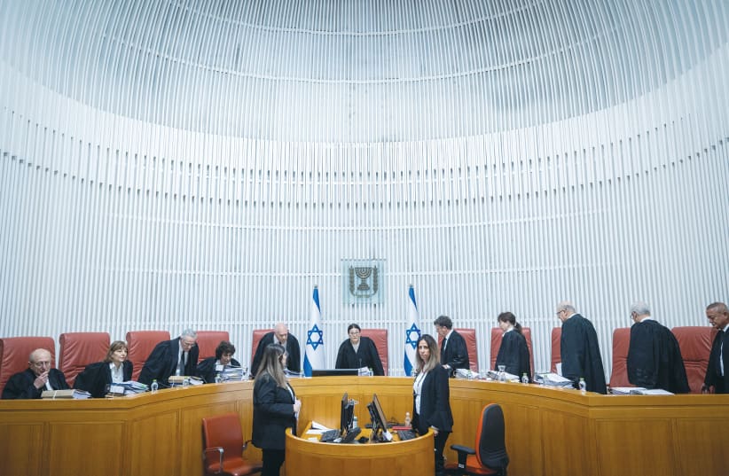  UPREME COURT President Esther Hayut and justices take their seats for a hearing on January 5 regarding the appointment of Shas leader Arye Deri as a minister.  (photo credit: YONATAN SINDEL/FLASH90)