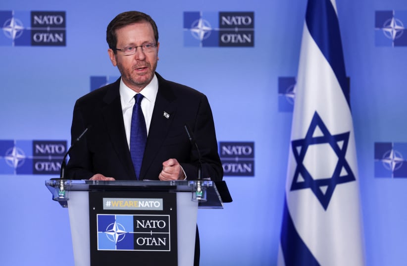  Israeli President Isaac Herzog holds a news conference at the Alliance's headquarters in Brussels, Belgium January 26, 2023 (photo credit: REUTERS/YVES HERMAN)