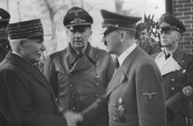  Philippe Pétain shakes hands with Hitler (photo credit: Heinrich Hoffman/Wikimedia Commons)