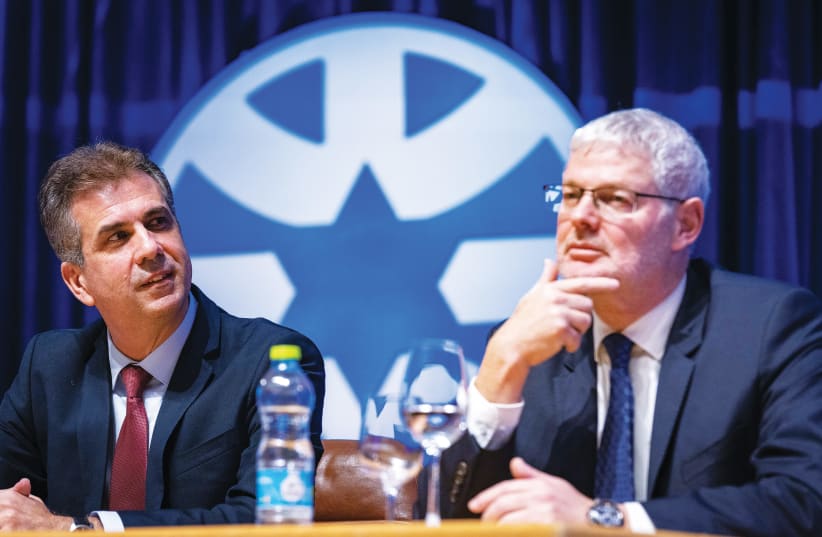  FOREIGN MINISTRY Director-General Alon Ushpiz (right) sits alongside Foreign Minister Eli Cohen at a ceremony at the Foreign Ministry in Jerusalem when Cohen was welcomed as the new minister. (photo credit: OLIVIER FITOUSSI/FLASH90)