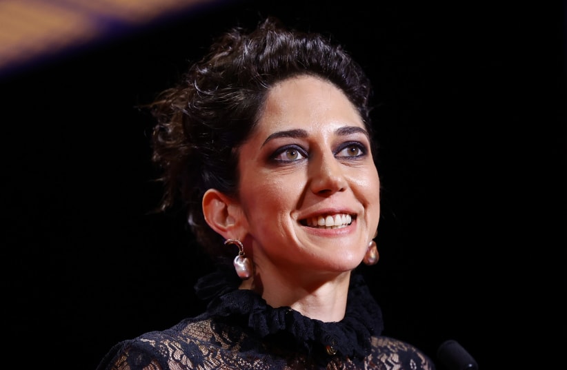 The 75th Cannes Film Festival - Closing ceremony - Cannes, France, May 28, 2022. Zar Amir-Ebrahimi, Best Actress award winner for her role in the film "Holy Spider" (Les Nuits de Mashhad), reacts. (photo credit: REUTERS/SARAH MEYSSONNIER)