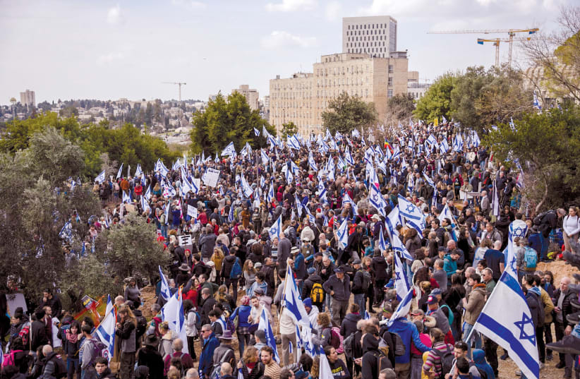  ISRAELIS MAKE their feelings known in Jerusalem this past Monday.  (photo credit: ERIK MARMOR/FLASH90)