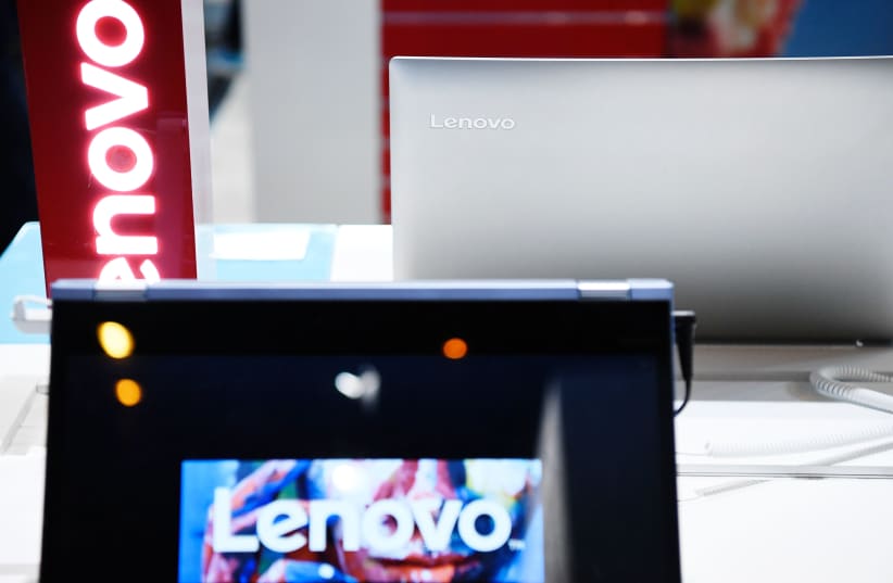  A logo of the Chinese multinational technology company, Lenovo is pictured on a screen of the Lenovo's exhibition stand during the Vivatec trade fair (Viva Technology), on May 24, 2018, in Paris.  (photo credit: ALAIN JOCARD/AFP via Getty Images)