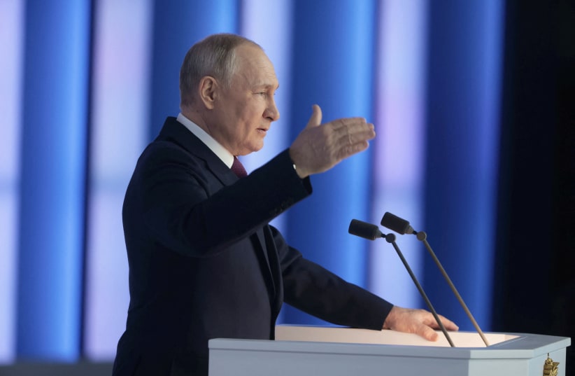  Russian President Vladimir Putin delivers his annual address to the Federal Assembly in Moscow, Russia February 21, 2023. (photo credit: SPUTNIK/MIKHAIL METZEL/POOL VIA REUTERS)