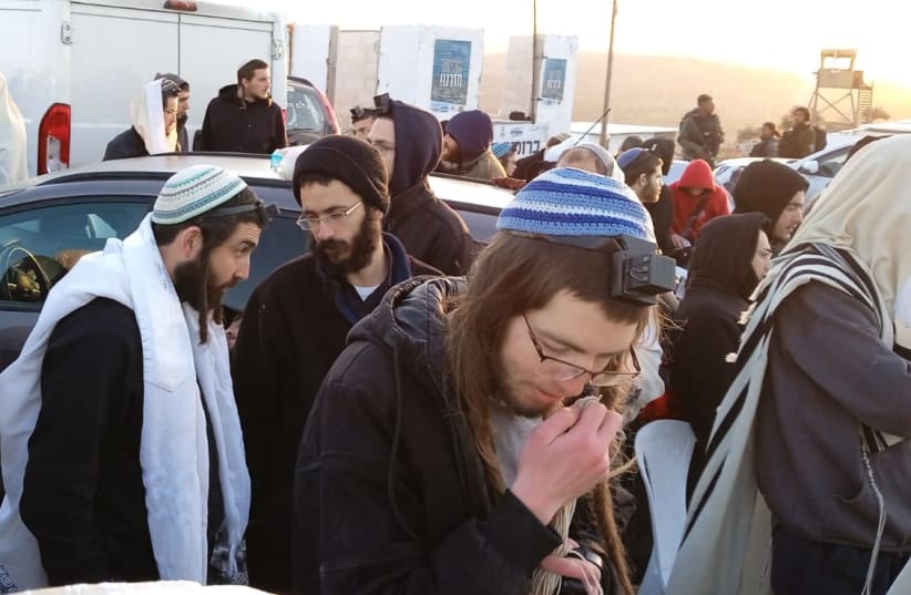  Religious Zionist Party MK Zvi Sukkot joins settlers to reestablish the Evyatar outpost, on February 27, 2023. (photo credit: Yanon Krakover)