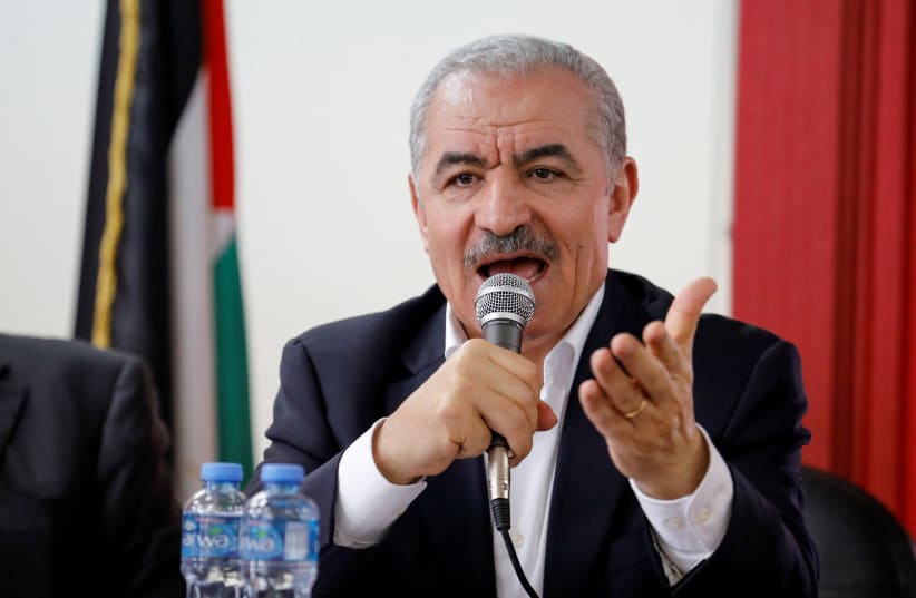 Palestinian Prime Minister Mohammad Shtayyeh speaks as he visits after Israeli settlers' rampage in Hawara in the West Bank, March 1, 2023 (photo credit: REUTERS/RANEEN SAWAFTA)
