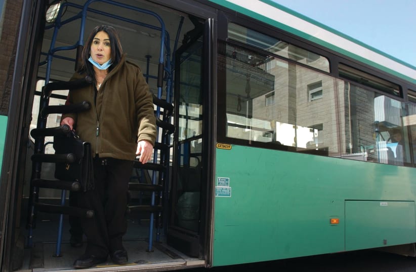  MIRI REGEV gets ready to strip search commuters on her new shuttle bus. (John Paul Getty Images) (photo credit: COMPLIMENTS OF UA, FLASH90)