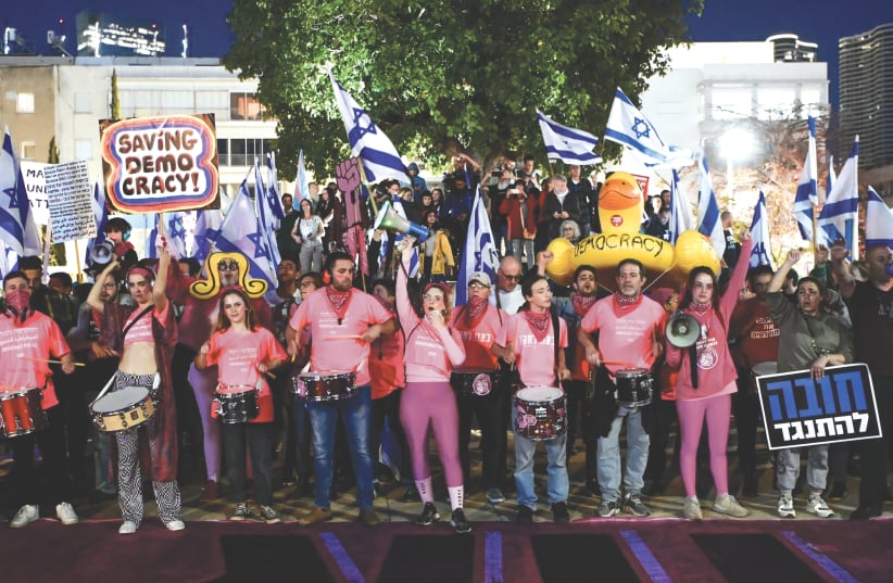  A MARCH in Tel Aviv against the government’s proposed judicial overhaul, on Saturday night. ‘I don’t demonstrate against; I demonstrate for,’ says the writer. (photo credit: AVSHALOM SASSONI/FLASH90)