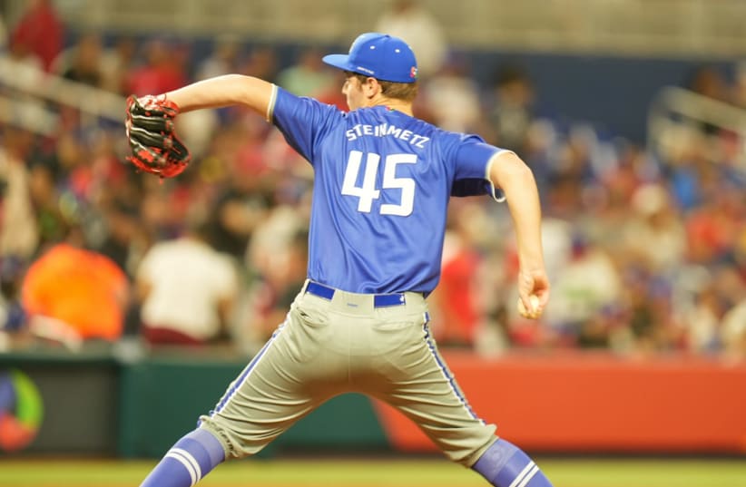  Jacob Steinmetz pitched for Team Israel against the Dominican Republic, March 14, 2023, in Miami.  (photo credit: DAN PASSNER/JTA)
