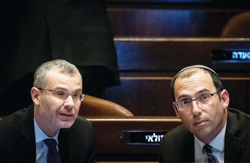  K SIMCHA ROTHMAN with Justice Minister Yariv Levin in the Knesset on Wednesday. (photo credit: YONATAN SINDEL/FLASH90)