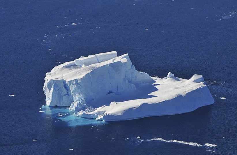Antarctic iceberg floating in the Amundsen Sea water, October 2009. (photo credit: NASA/JANE PETERSON/PUBLIC DOMAIN/VIA WIKIMEDIA COMMONS)