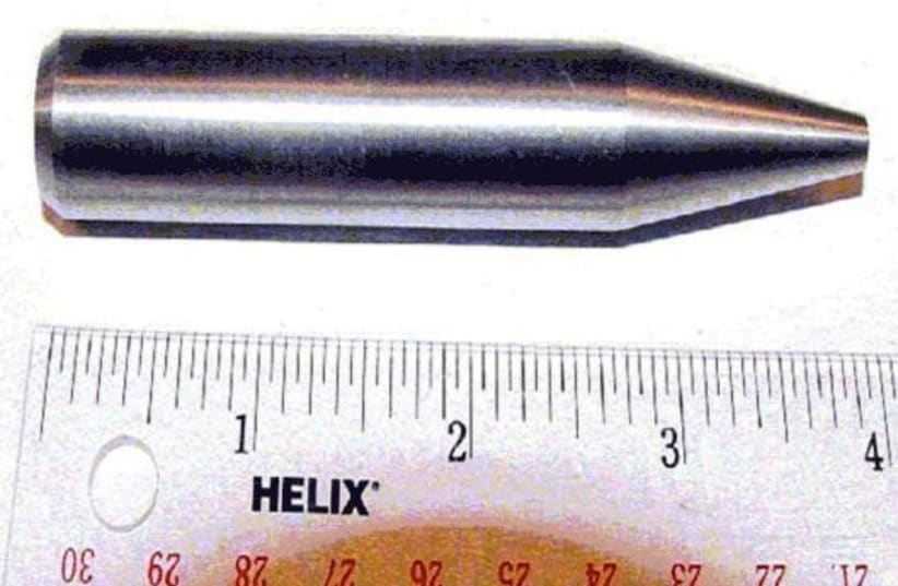 The depleted uranium penetrator of a 30 mm round (photo credit: CHOIHEI/OFFICE OF THE SECRETARY OF DEFENSE/PUBLIC DOMAIN/VIA WIKIMEDIA COMMONS)