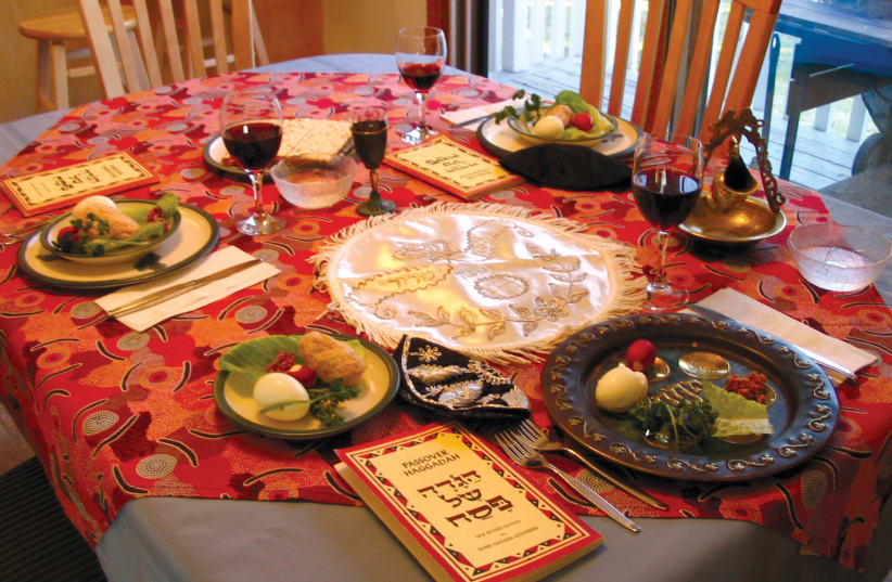  A traditional Seder table setting. (photo credit: WIKIPEDIA)