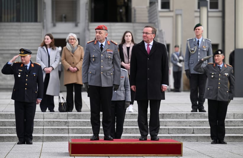  German Defense Minister Boris Pistorius and Carsten Breuer review the troops during the inauguration of Breuer as Inspector General of the Bundeswehr in Berlin, Germany, March 17, 2023. (photo credit: REUTERS/ANNEGRET HILSE)