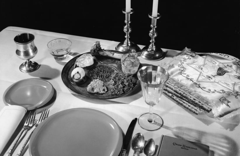  TABLE SET for Seder, 1950s. (photo credit: Hulton Archive/Getty Images)