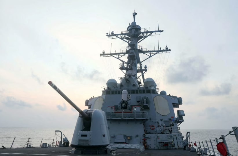  The Arleigh Burke-class guided-missile destroyer USS Milius (DDG-69), deployed to the US 7th Fleet area of operations, conducts underway operations, at an undisclosed location in South China Sea, in this handout picture released on April 10, 2023. (photo credit: US NAVY/HANDOUT VIA REUTERS)