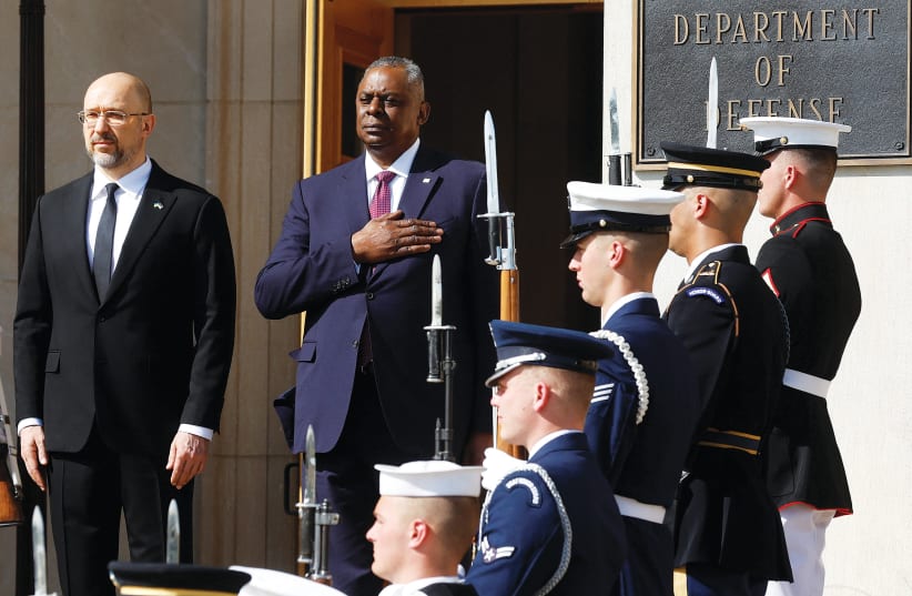  US DEFENSE SECRETARY Lloyd Austin and Ukraine’s Prime Minister Denys Shmyhal stand for their national anthems as Denys is welcomed to the Pentagon on Wednesday. (photo credit: JONATHAN ERNST/REUTERS)