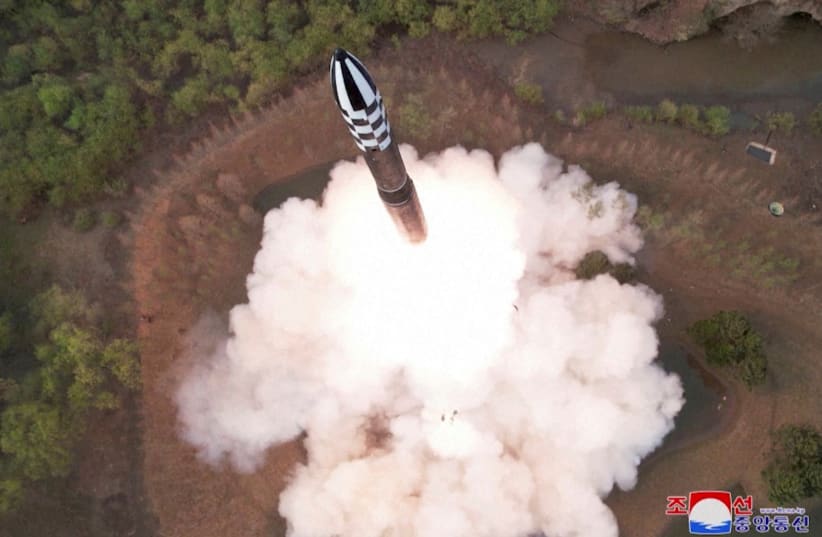  A view of a test launch of a new solid-fuel intercontinental ballistic missile (ICBM) Hwasong-18 at an undisclosed location in this still image of a photo used in a video released by North Korea's Korean Central News Agency (KCNA) April 14, 2023 (photo credit: KCNA/VIA REUTERS)