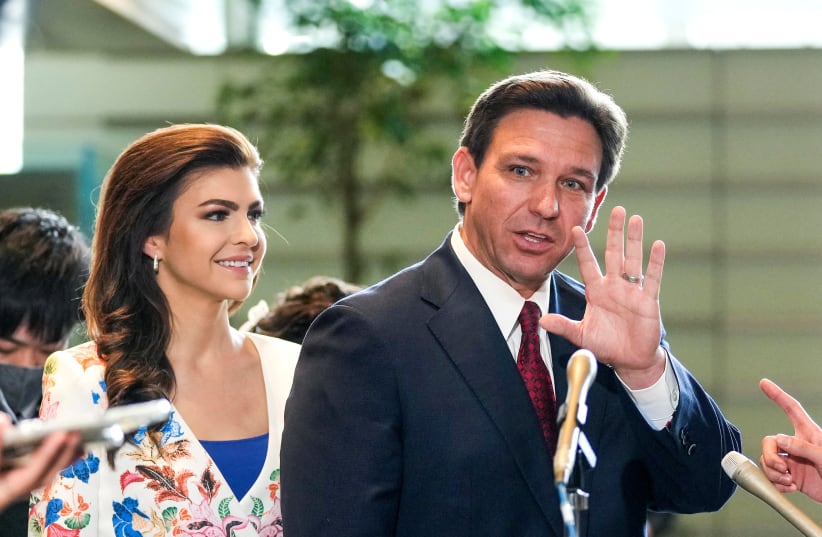  Florida Governor Ron DeSantis bids farewell to journalists as he closes talks with journalists after meeting Japanese Prime Minister Fumio Kishida at the latter's official residence in Tokyo, Japan, 24 April 2023. (photo credit: KIMIMASA MAYAMA/Pool via REUTERS)