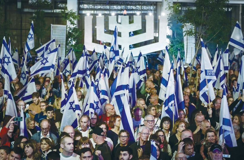  A PROTEST takes place against the judicial overhaul, in Tel Aviv, at the beginning of Independence Day, on Tuesday night. The protesters have behaved admirably and so has the government, says the writer. (photo credit: AVSHALOM SASSONI/FLASH90)