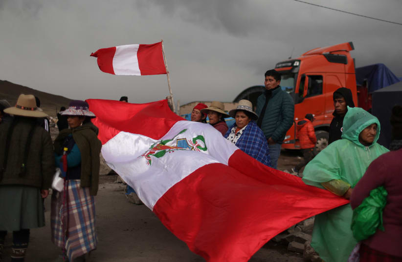  Anti-government protestors block a road demanding the resignation of Peru's President Dina Boluarte, in Condoroma in Cusco region, Peru February 4, 2023 (photo credit: REUTERS/PILAR OLIVARES)