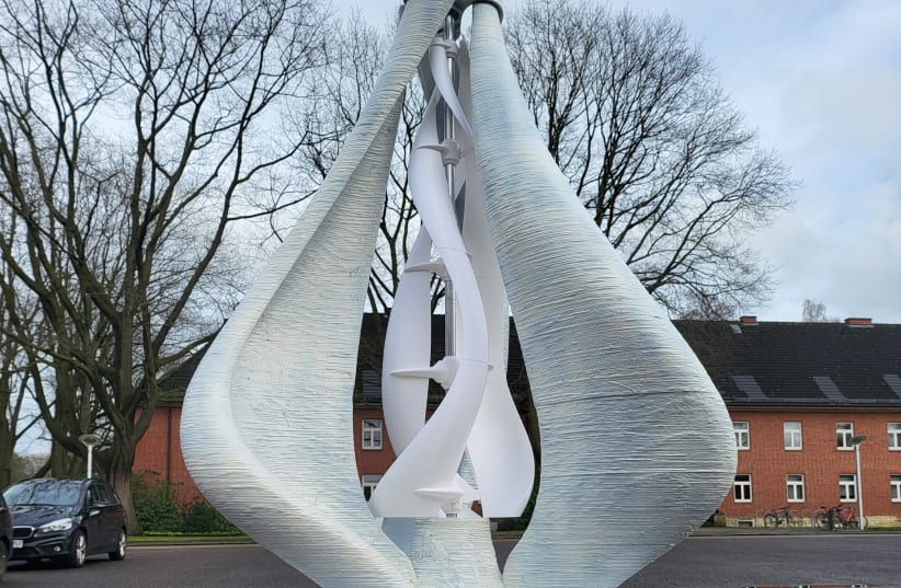  The proprietary large-scale 3D-printer "HoneyComb3D"  and one of its printed wind turbines. (photo credit: Constructor University)