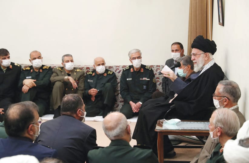  IRANIAN SUPREME LEADER Ayatollah Ali Khamenei speaks during a meeting with military officials in Tehran, last month.  (photo credit: Iranian Presidential Website/WANA/handout via Reuters)