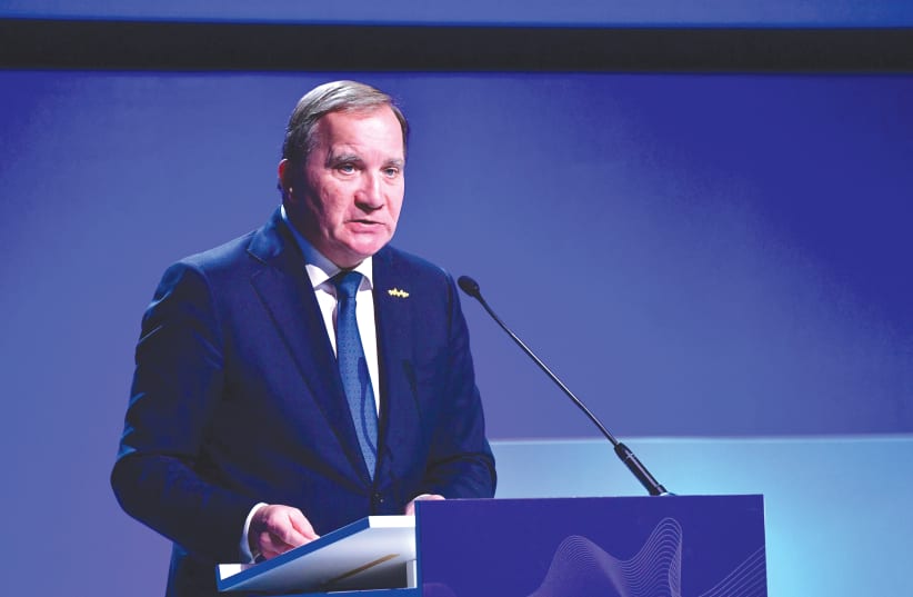  THEN-SWEDISH prime minister Stefan Lofven speaks at the concluding plenary session of the Malmö International Forum on Holocaust Remembrance and Combating Antisemitism, in 2021.  (photo credit: TT News Agency/Reuters)