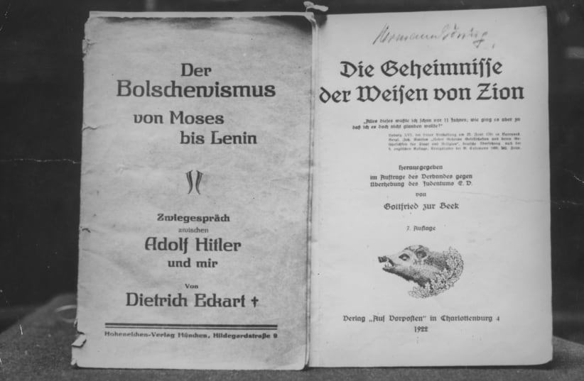  The title pages of a Nazi-published version of "The Protocols of the Elders of Zion," an antisemitic text, circa 1935. (photo credit: Hulton Archive/Getty Images)