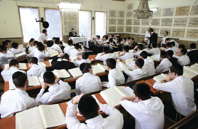  HAREDI YESHIVA students: These 135,000 boys, and then men, and then senior citizens, who will also not pay health tax, will place a heavy burden on the health care system in around 60 years’ time. (photo credit: YAAKOV COHEN/FLASH90)