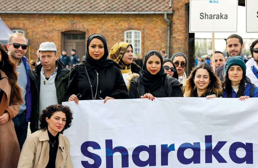  A delegation of Arab influencers from Sharaka gather at March of the Living in Poland in April.  (photo credit: Sharaka)
