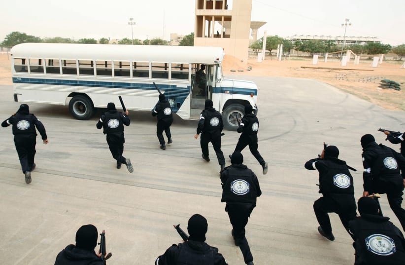  STUDENTS TRAIN in the Drug and Poison Division of King Fahad Security College, in Riyadh.  (photo credit: Fahad Shadeed/Reuters)