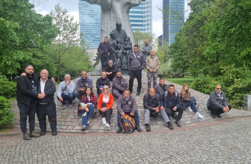  Participants of the group at the monument for the Warsaw Ghetto fighters. (photo credit: Ismail Hajj Yehye)