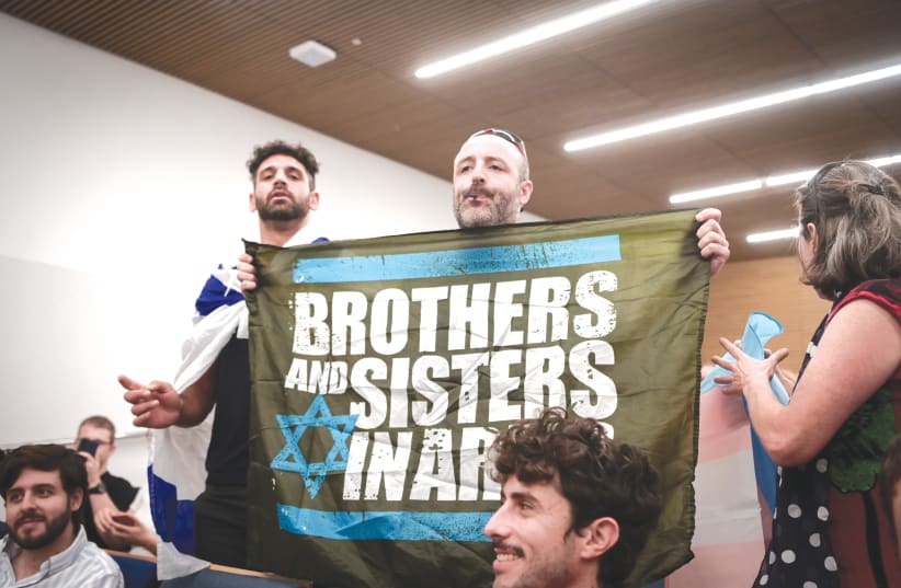  PROTESTERS DISRUPT a panel discussion with Knesset Constitution, Law and Justice Committee Chairman Simcha Rothman in Tel Aviv, last month. (photo credit: AVSHALOM SASSONI/FLASH90)