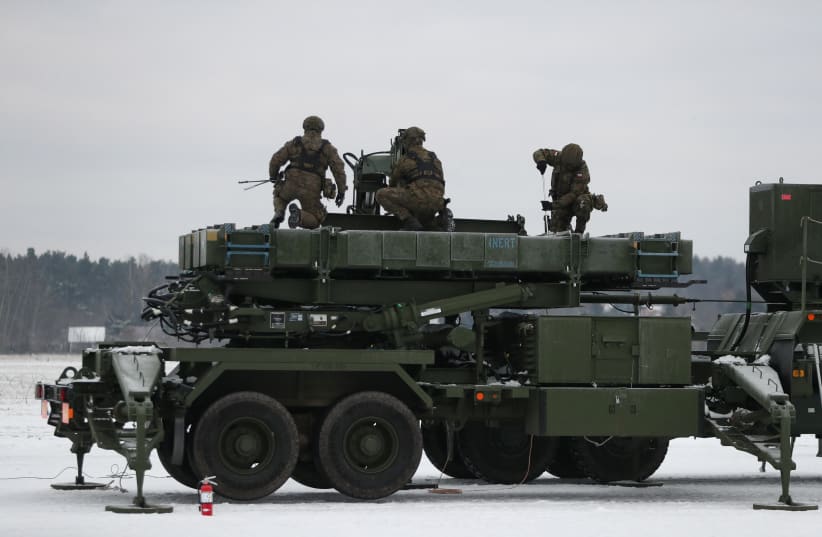  Polish servicemen train as they stand on the Patriot air missile defence system at the airport in Warsaw, February 7, 2023. (photo credit: KACPER PEMPEL/REUTERS)