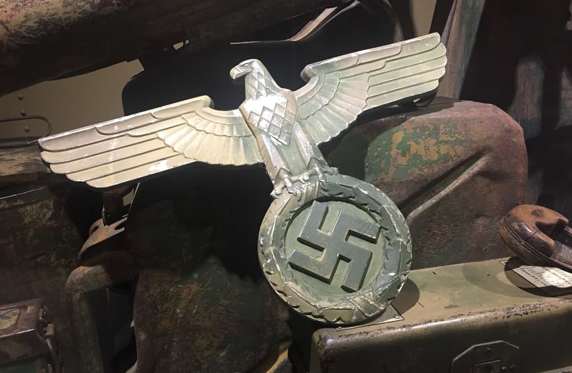  A Nazi eagle wall decoration at the Dead Man's Corner Museum in France. (photo credit: Wikimedia Commons)